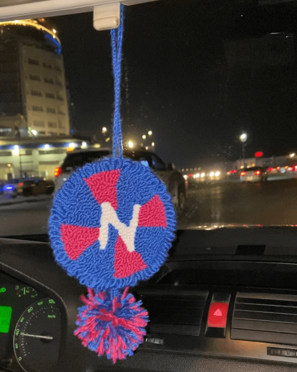 The bold car hanger in blue