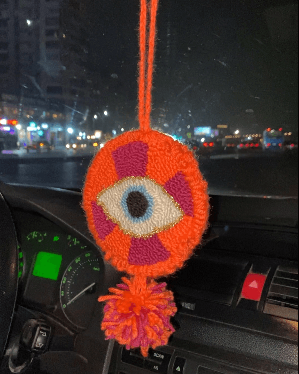 The bold car hanger in orange